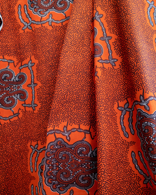 Tissu au yard Tortoise rouge